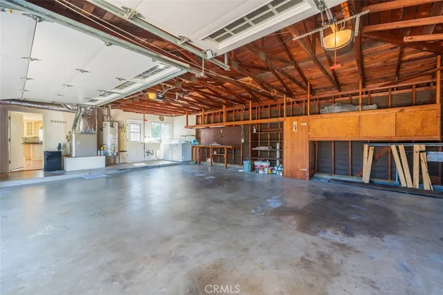 a wooden fence with some plants