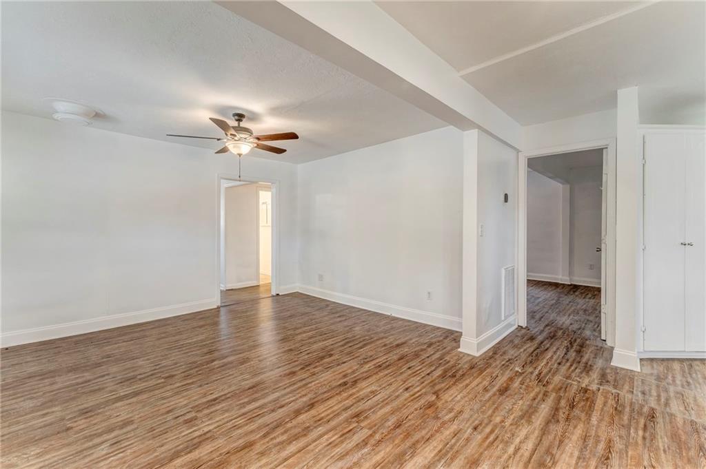 2888 Old Summerville Road Armuchee, GA 30105 - Photo 20 of 37 wooden floor in an empty room with a window