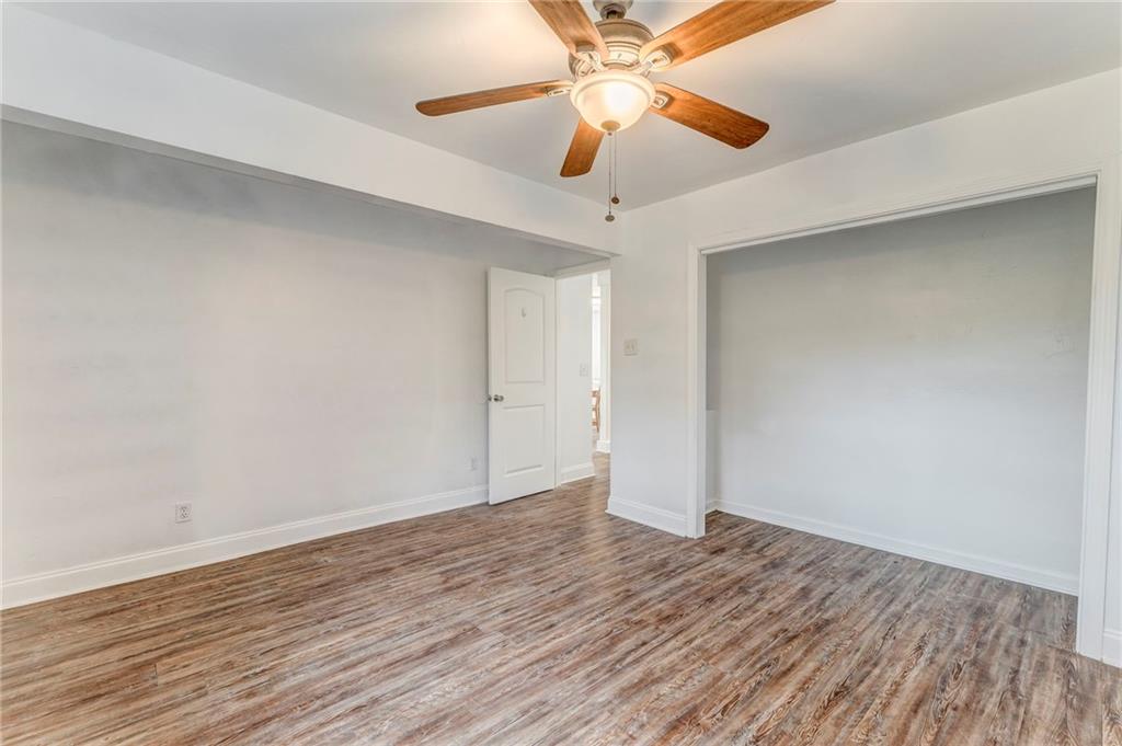 2888 Old Summerville Road Armuchee, GA 30105 - Photo 23 of 37 a view of an empty room with wooden floor