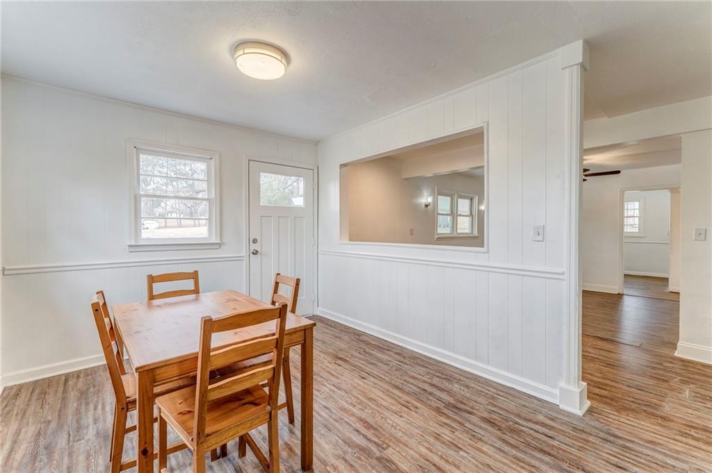 2888 Old Summerville Road Armuchee, GA 30105 - Photo 26 of 37 a dining room with furniture and wooden floor