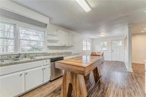 a view of a porch with a bench