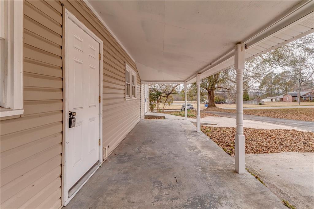 2888 Old Summerville Road Armuchee, GA 30105 - Photo 33 of 37 a view of a porch with a bench