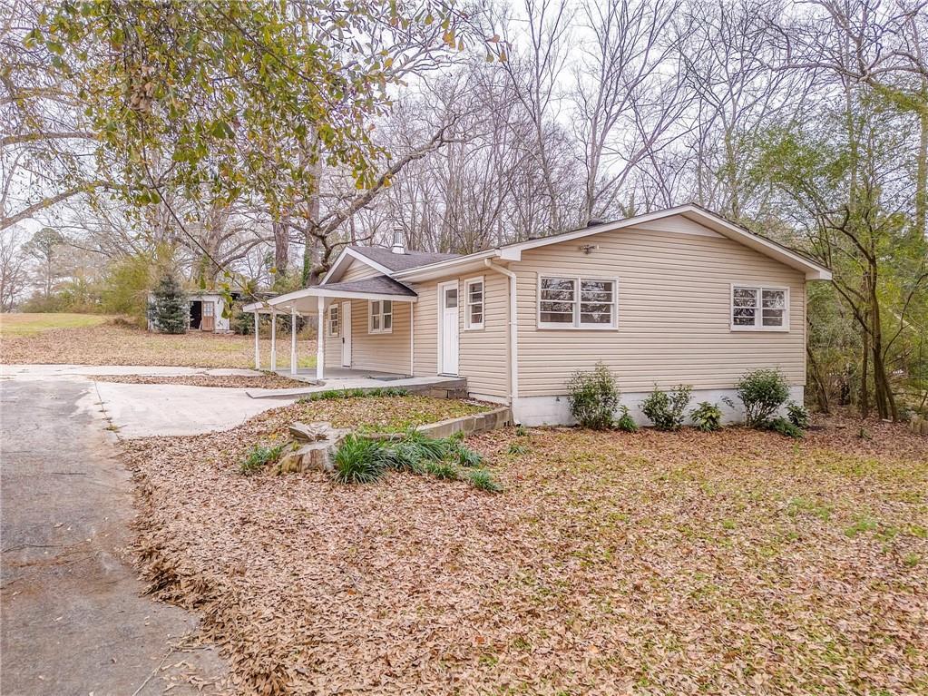 2888 Old Summerville Road Armuchee, GA 30105 - Photo 7 of 37 a house view with outdoor space