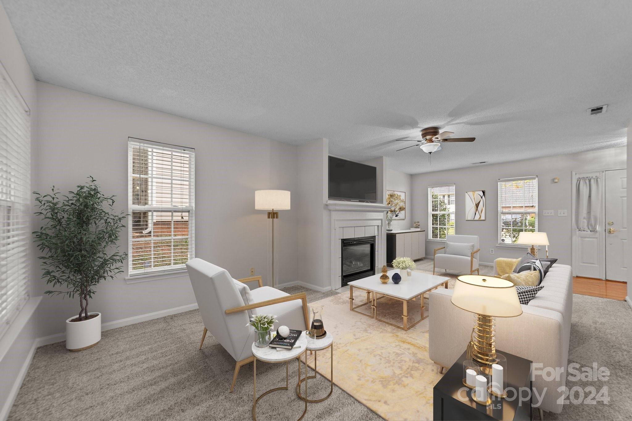 8424 Conner Ridge Lane Charlotte, NC 28269 - Photo 12 of 48 a living room with fireplace furniture and a potted plant