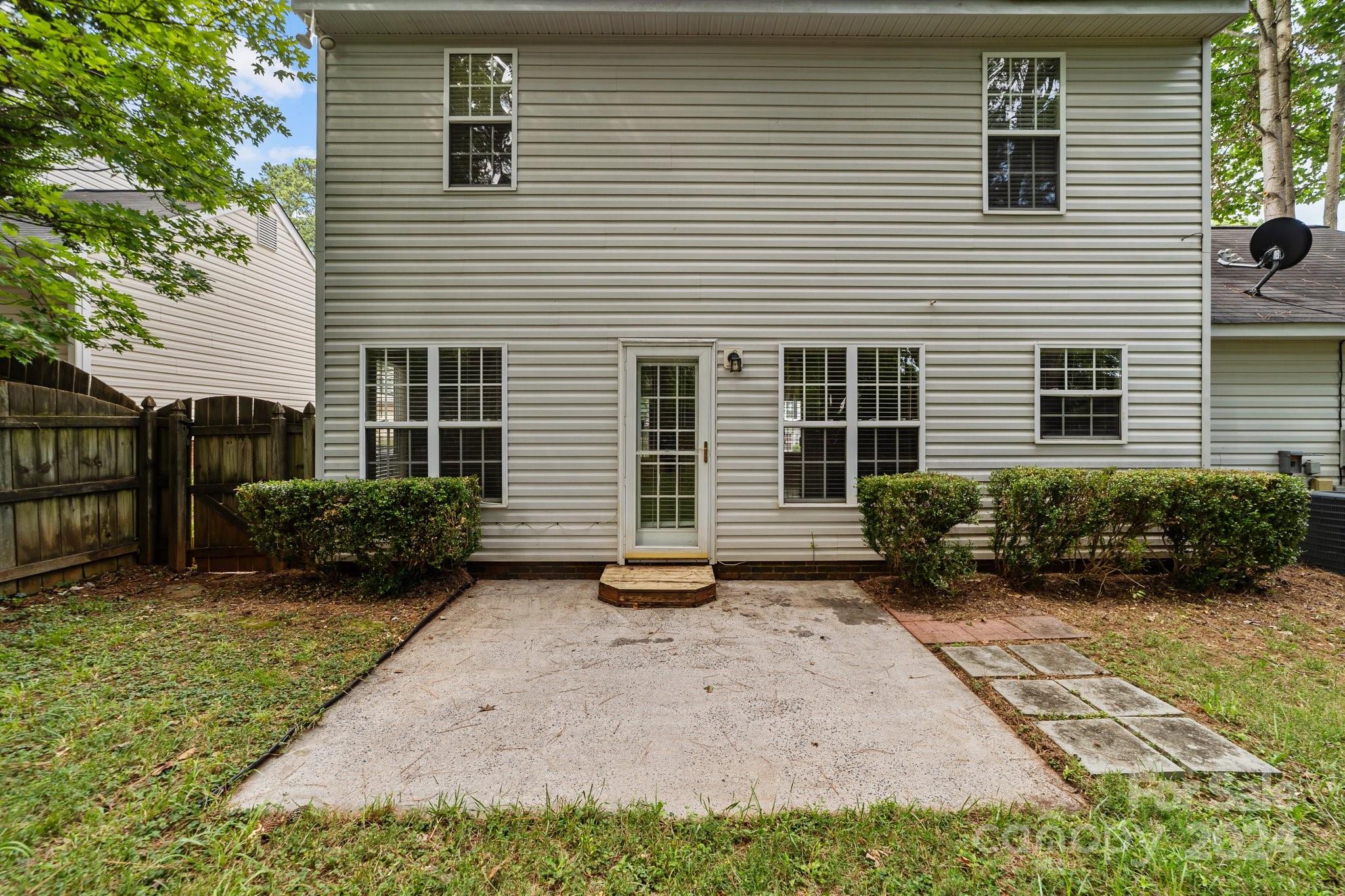 8424 Conner Ridge Lane Charlotte, NC 28269 - Photo 38 of 48 a view of a house with backyard and garden