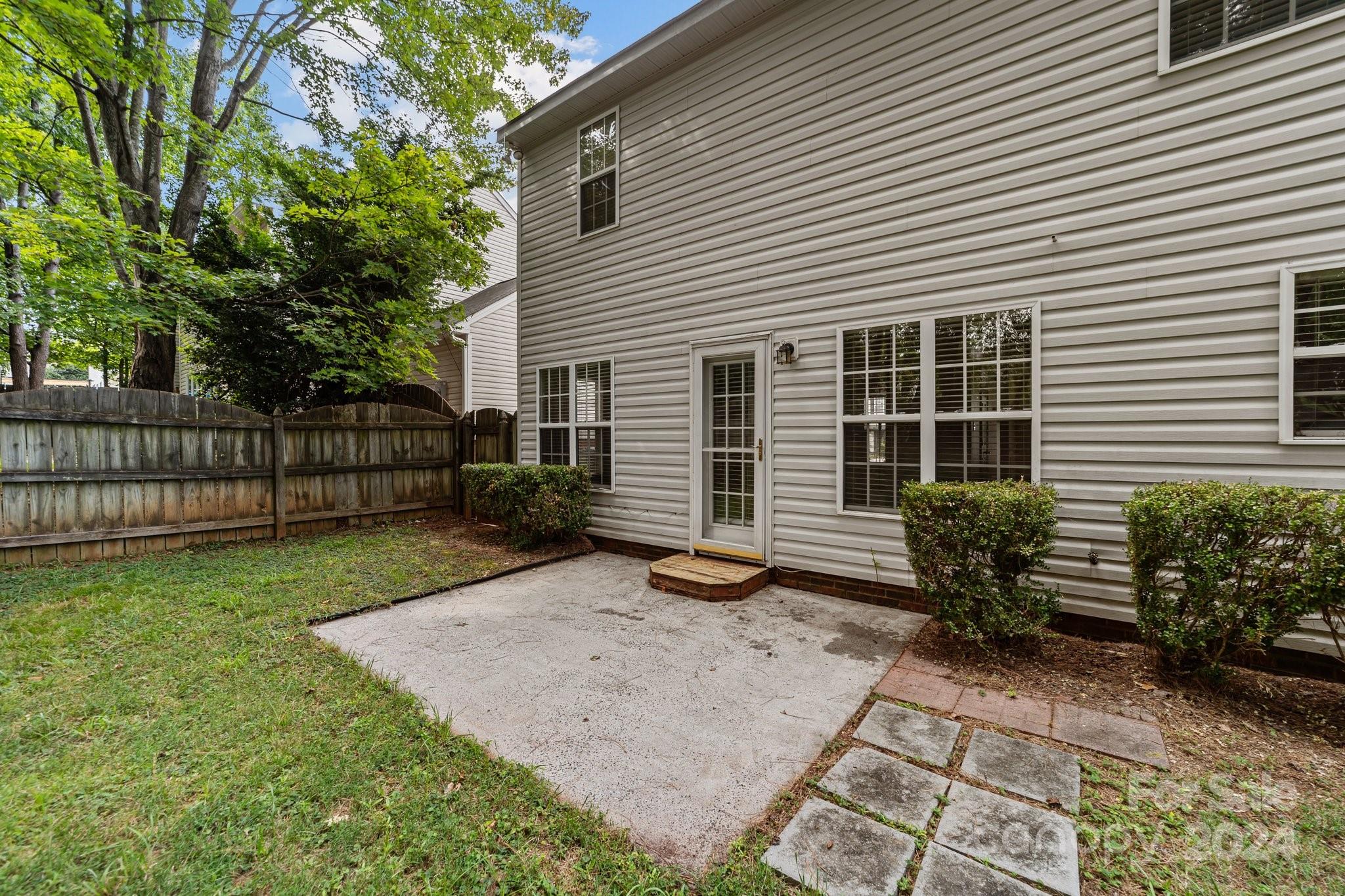 8424 Conner Ridge Lane Charlotte, NC 28269 - Photo 39 of 48 a view of a house with backyard and sitting area