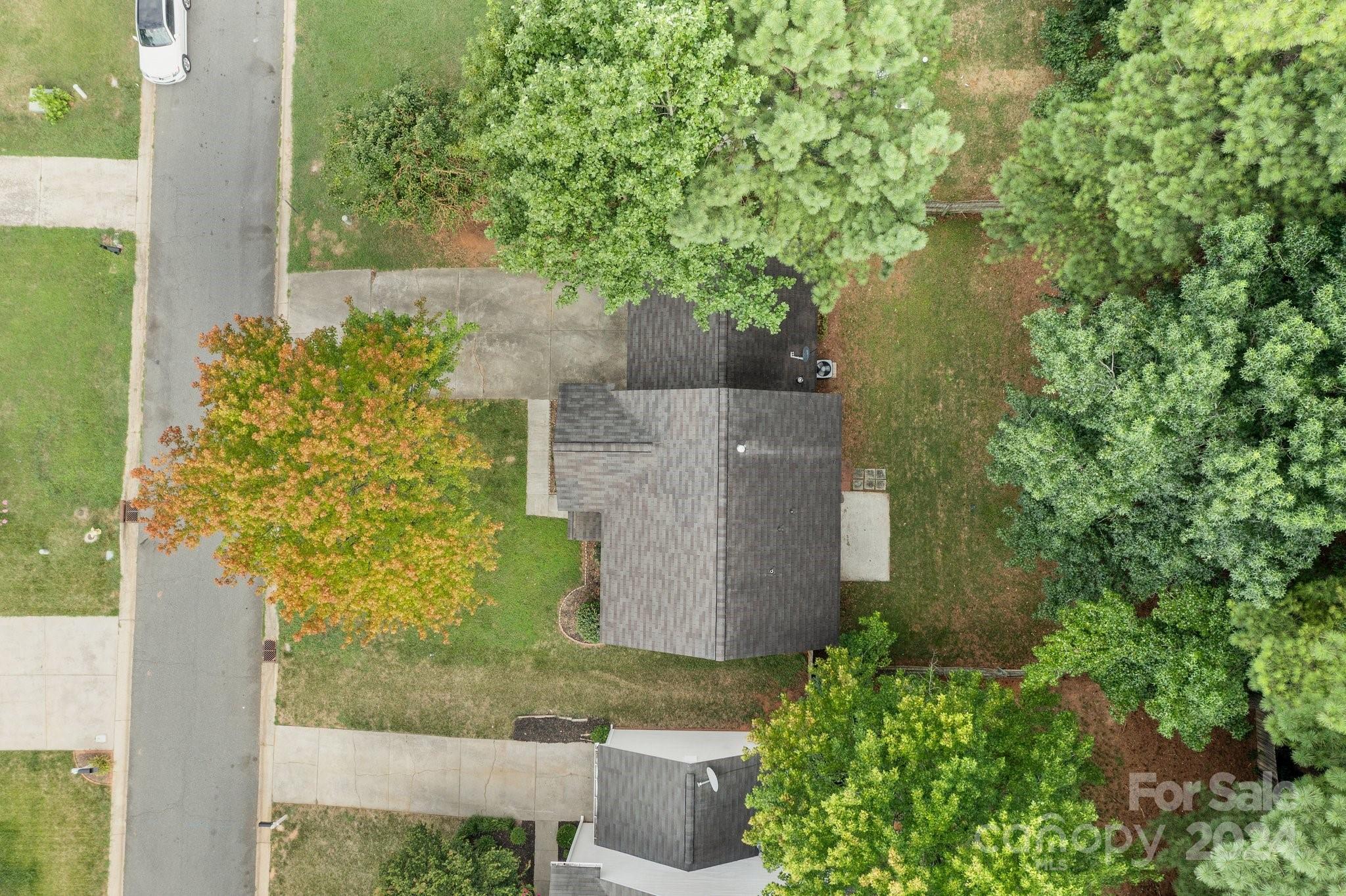 8424 Conner Ridge Lane Charlotte, NC 28269 - Photo 45 of 48 an aerial view of a house with a yard