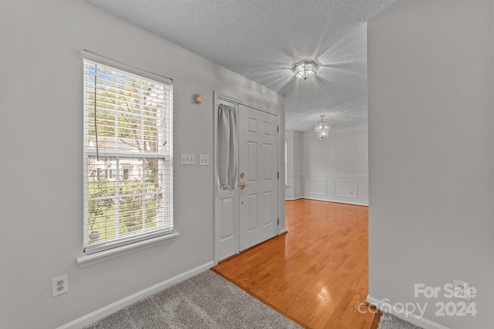 8424 Conner Ridge Lane Charlotte, NC 28269 - Photo 6 of 48 a view of an empty room with a window
