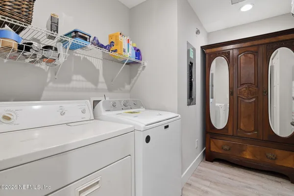 a utility room with dryer and washer