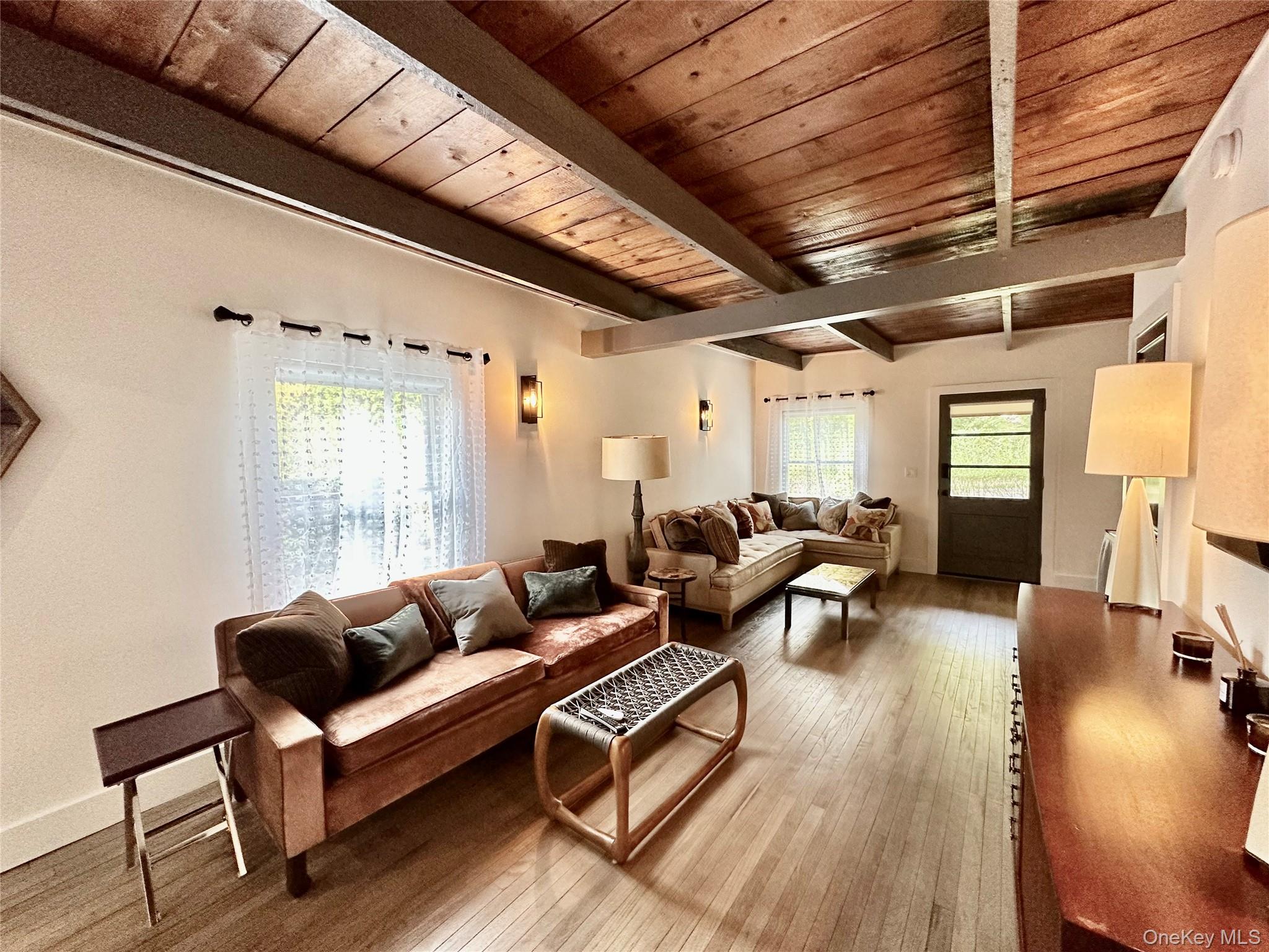 1350 Brick Kiln Road Sag Harbor, NY 11963 - Photo 7 of 21 a living room with furniture and a wooden floor