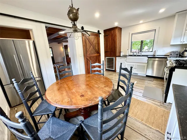 a view of a dining room with furniture