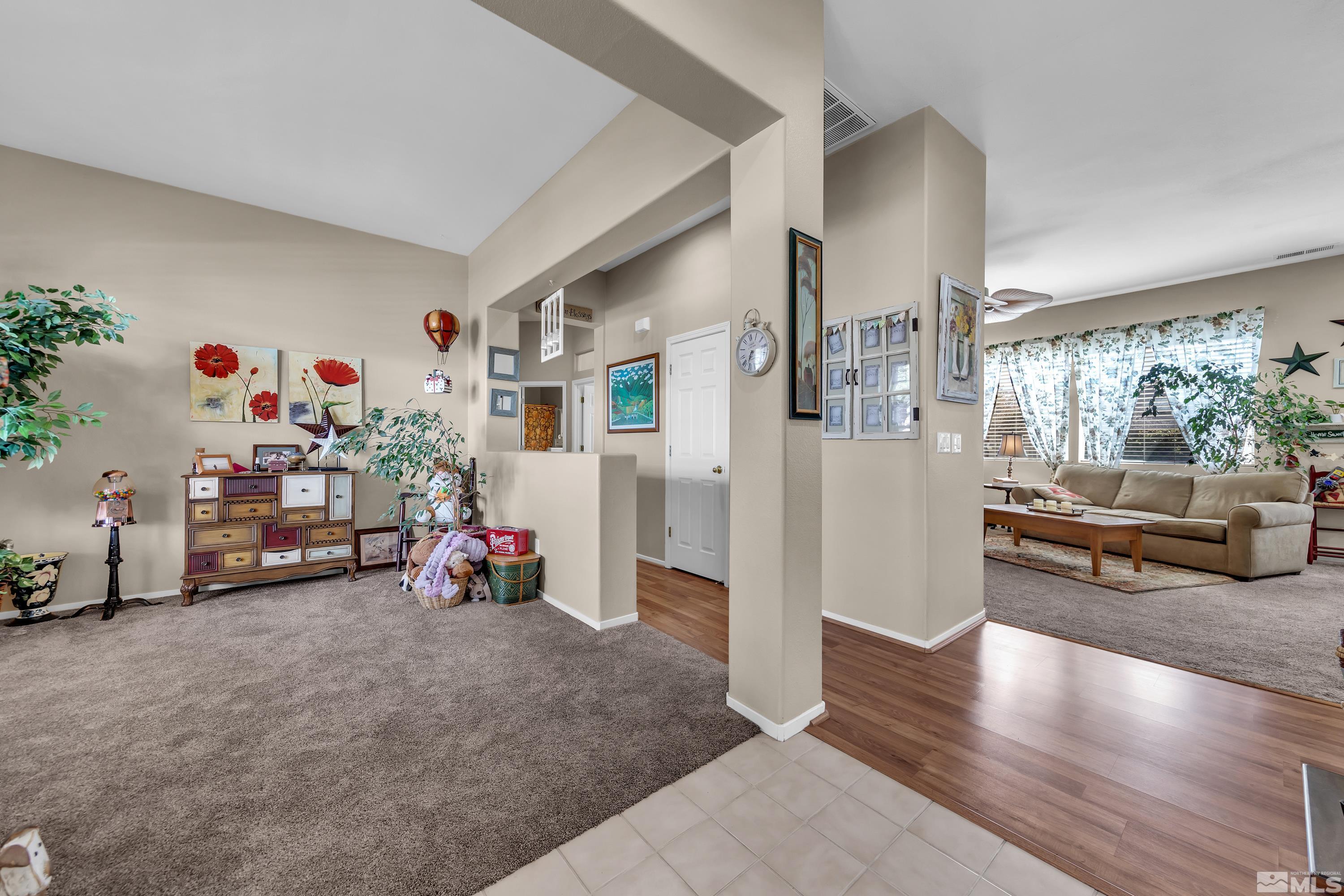 1496 Gaucho Lane Reno, NV 89521 - Photo 11 of 40 a view of a livingroom with furniture and a couch