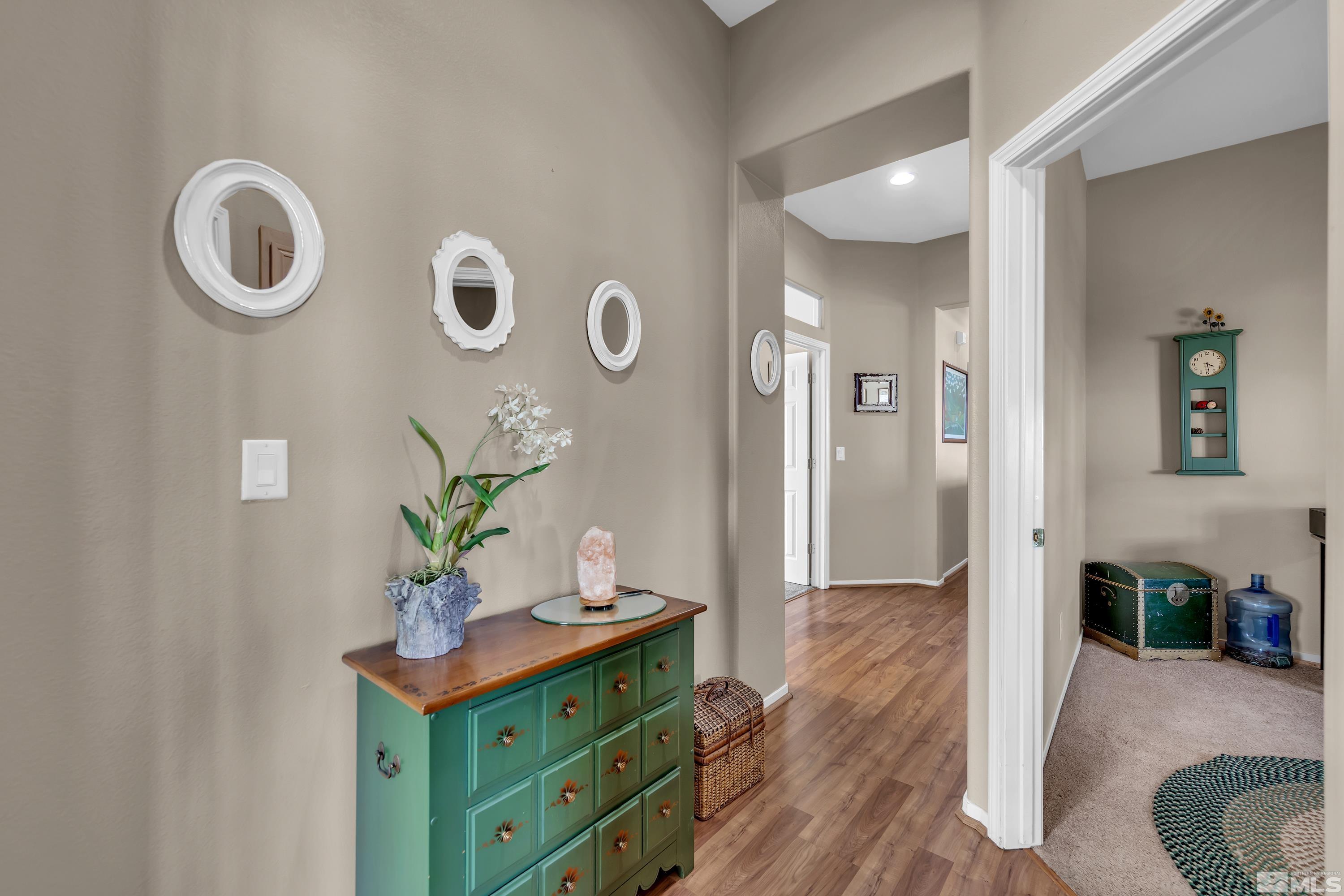 1496 Gaucho Lane Reno, NV 89521 - Photo 23 of 40 a living room with furniture and wooden floor