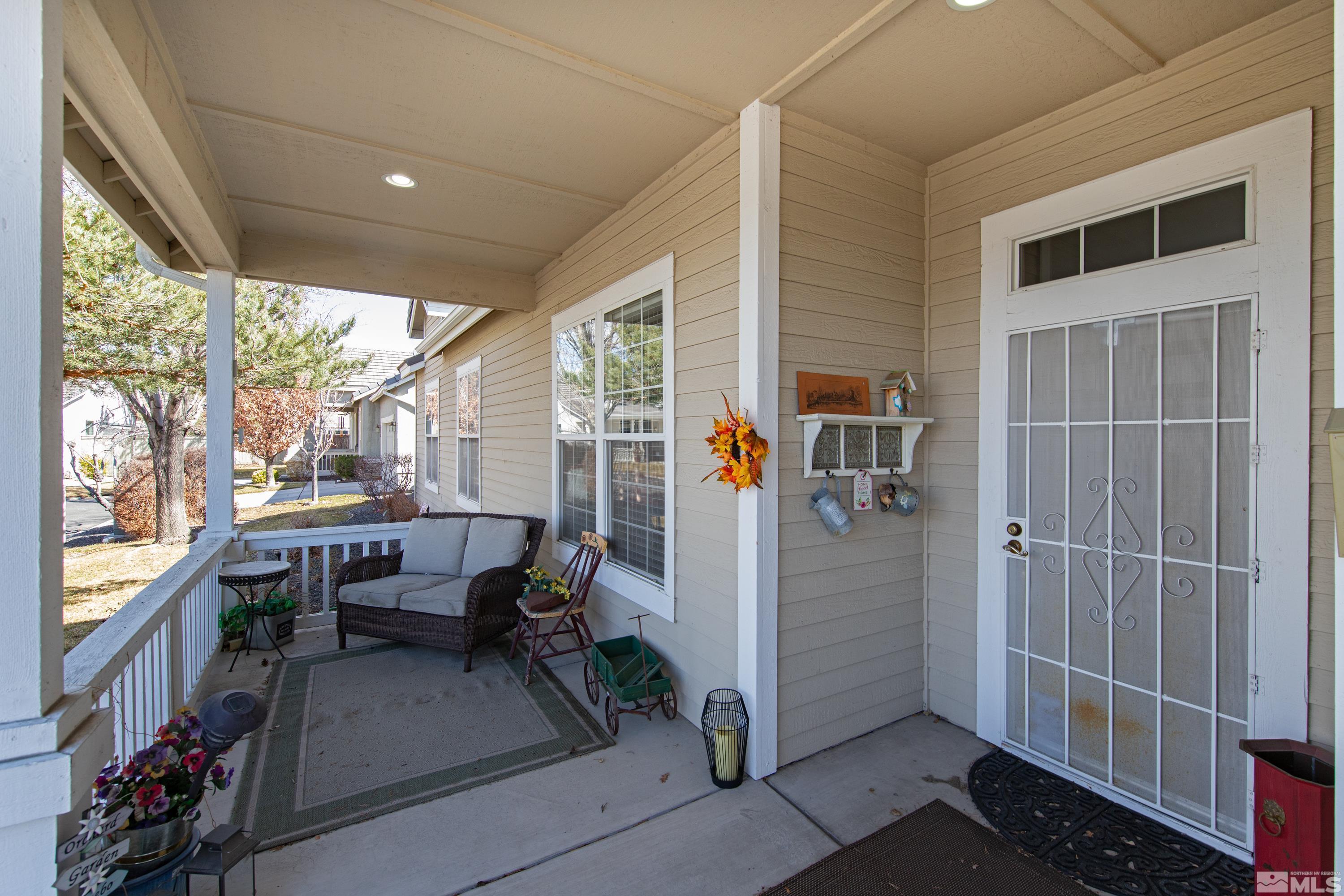 1496 Gaucho Lane Reno, NV 89521 - Photo 3 of 40 a view of living room kitchen outdoor space and barbecue grill