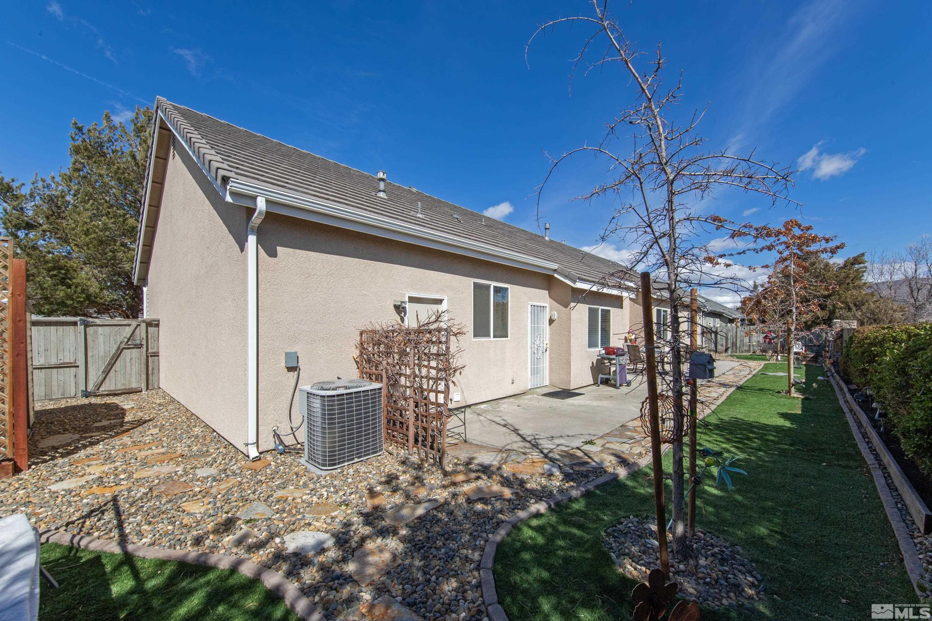 1496 Gaucho Lane Reno, NV 89521 - Photo 40 of 40 a front view of a house with garden
