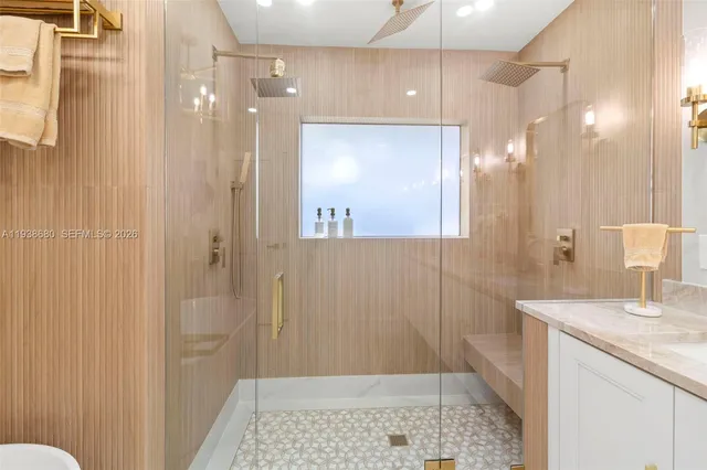 a bathroom with a double vanity sink and a mirror