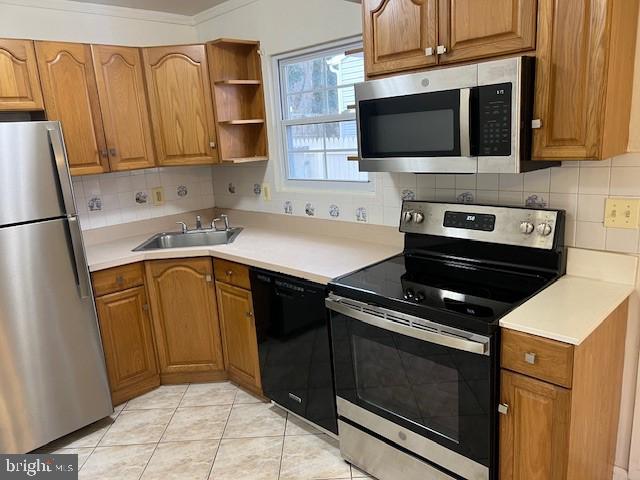 1640 Bay Ridge Road Edgewater, MD 21037 - Photo 9 of 25 a kitchen with a stove microwave and sink
