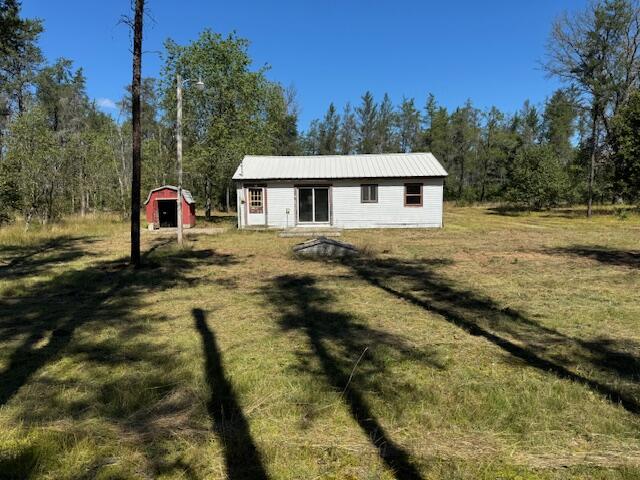 1844 East 10 Mile Road Irons, MI 49644 - Photo 1 of 13 Road view