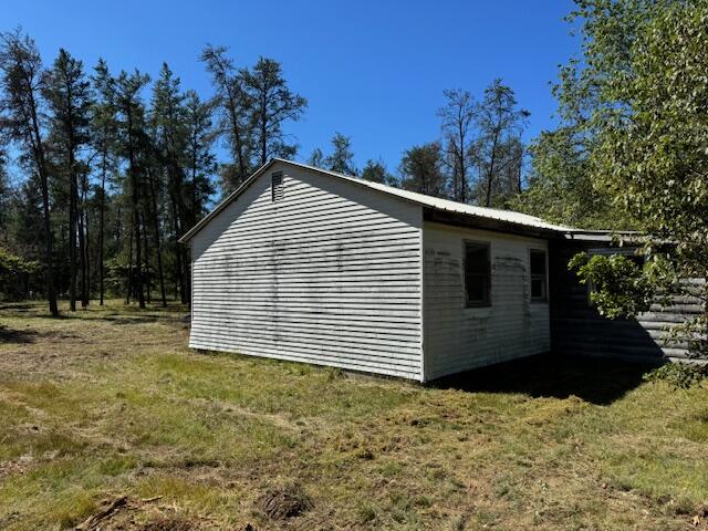 1844 East 10 Mile Road Irons, MI 49644 - Photo 4 of 13 Side view