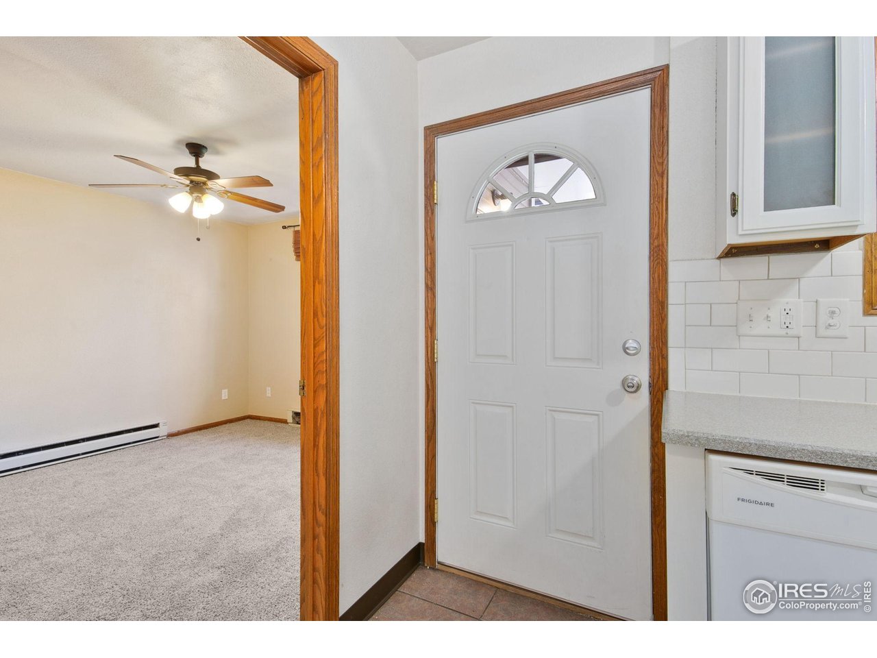 1231 West Swallow Road, Unit 316 Fort Collins, CO 80526 - Photo 21 of 42 a view of a hallway with front door