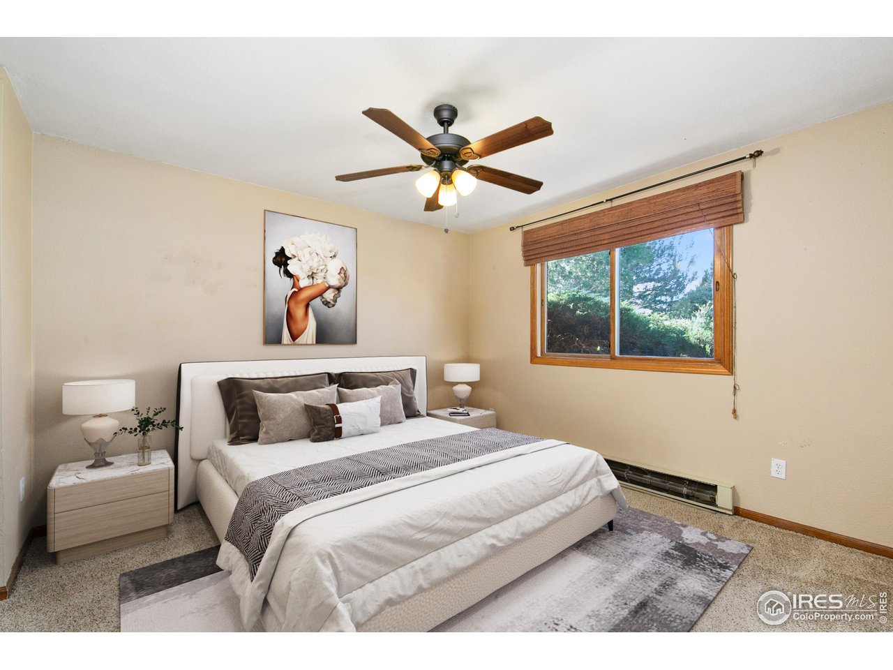 1231 West Swallow Road, Unit 316 Fort Collins, CO 80526 - Photo 22 of 42 a bedroom with a large bed and a window