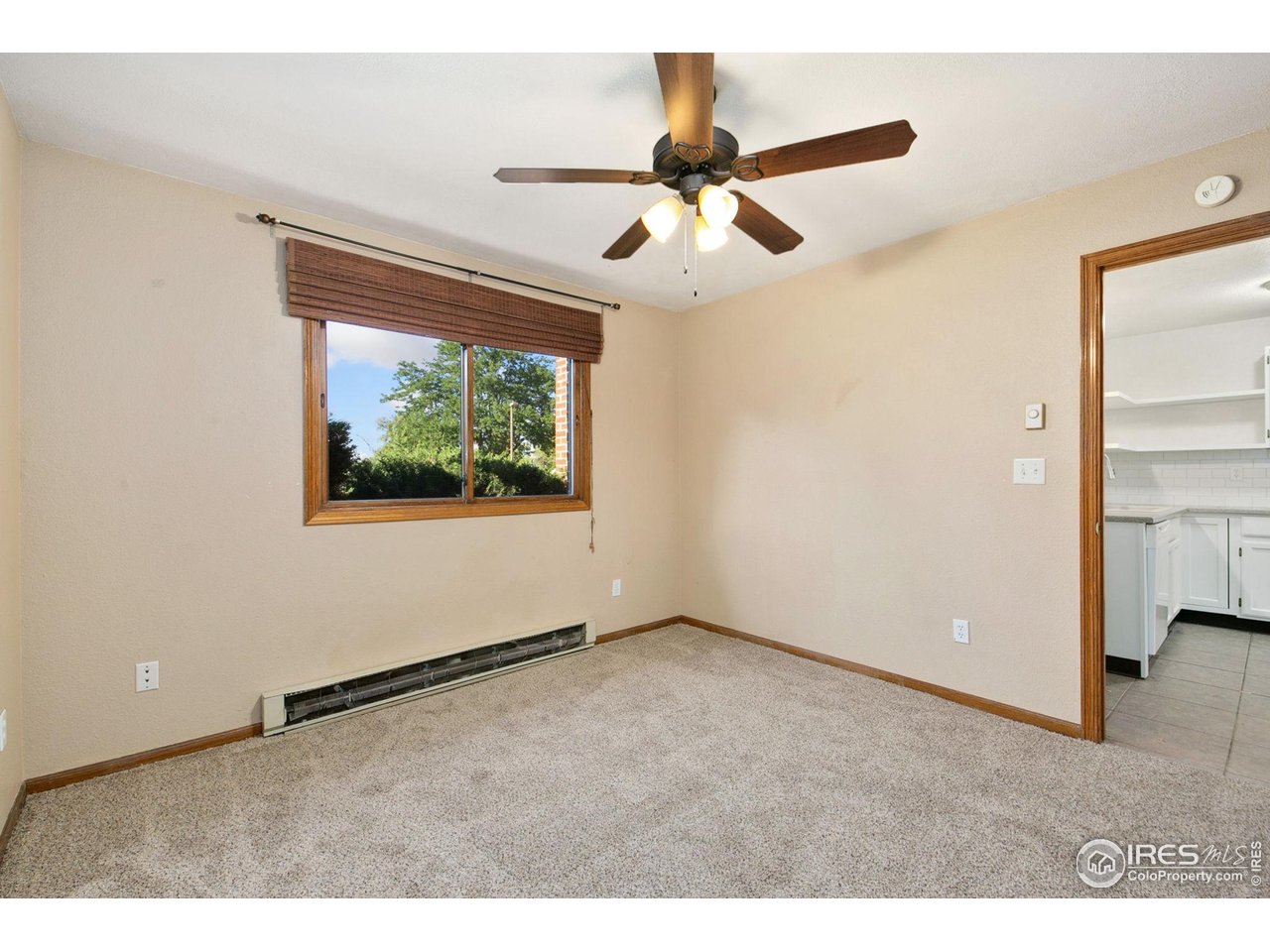 1231 West Swallow Road, Unit 316 Fort Collins, CO 80526 - Photo 23 of 42 a view of an empty room with a window