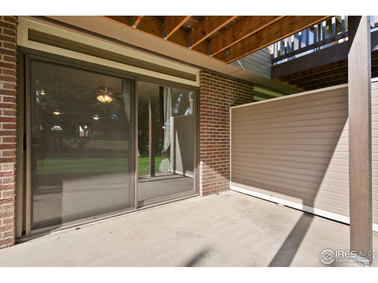 1231 West Swallow Road, Unit 316 Fort Collins, CO 80526 - Photo 38 of 42 a view of backyard with porch