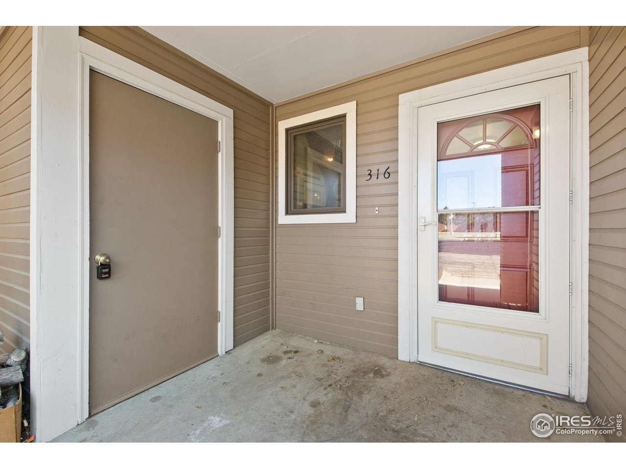 1231 West Swallow Road, Unit 316 Fort Collins, CO 80526 - Photo 6 of 42 a view of a room that has a large window