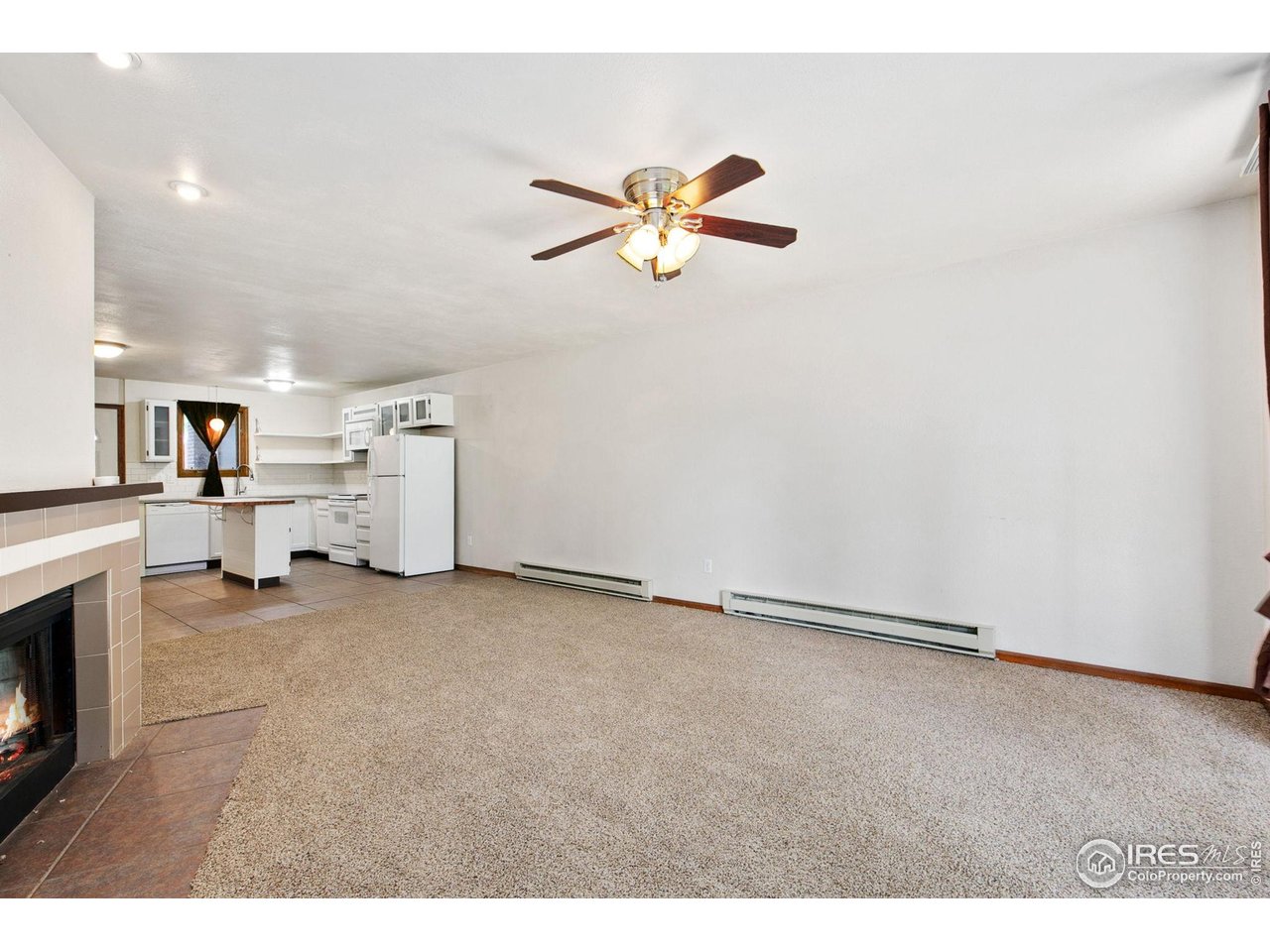 1231 West Swallow Road, Unit 316 Fort Collins, CO 80526 - Photo 10 of 42 a view of a livingroom with a fireplace