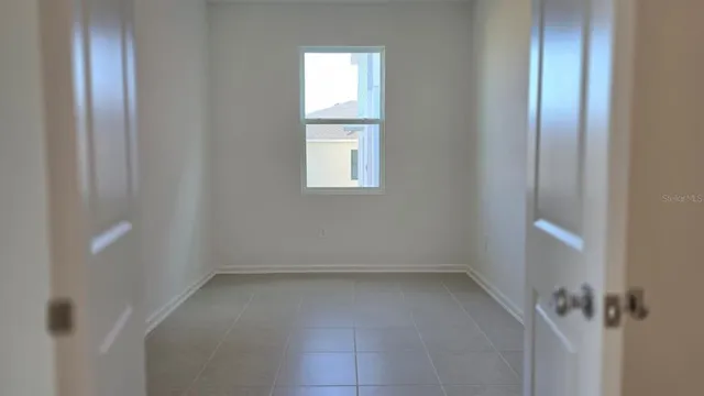 an empty room with a window