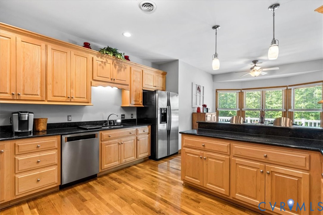 3060 Moyer Road Powhatan, VA 23139 - Photo 24 of 66 Kitchen featuring wood cabinetry, stainless steel