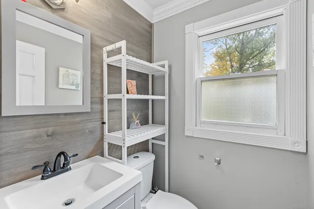 a bathroom with a sink and a toilet