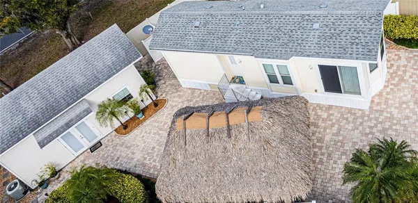 a house view with a backyard space