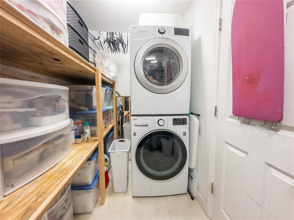 20300 Leonard Road, Unit 33 Lutz, FL 33558 - Photo 26 of 36 a utility room with dryer and washer