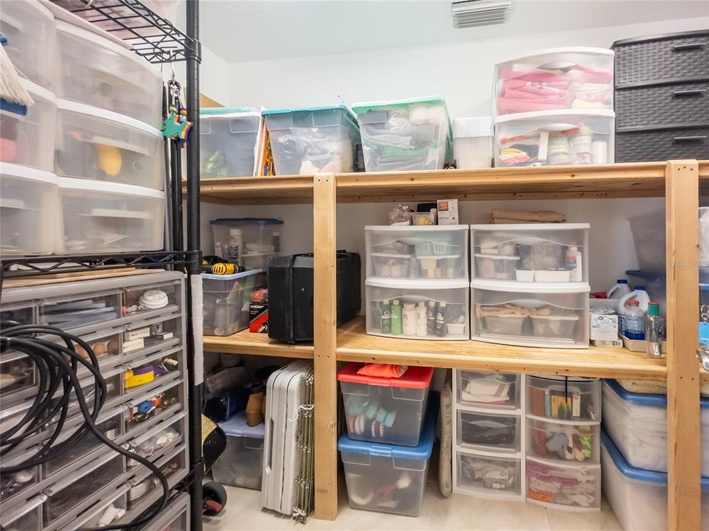 20300 Leonard Road, Unit 33 Lutz, FL 33558 - Photo 27 of 36 a view of storage and utility room