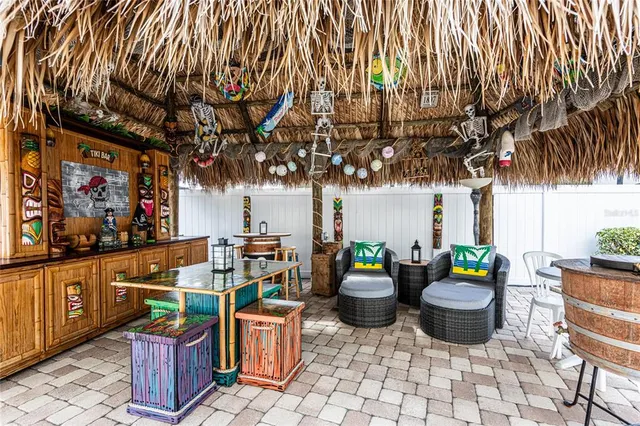 a outdoor living space with furniture and a fireplace