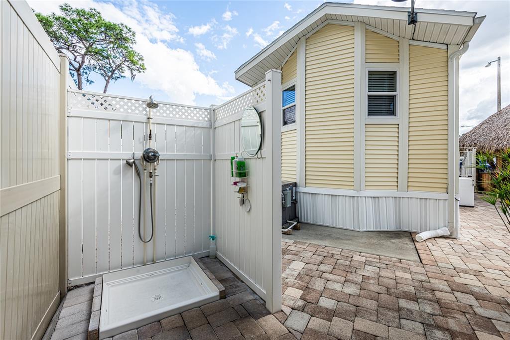 20300 Leonard Road, Unit 33 Lutz, FL 33558 - Photo 36 of 36 a view of a bathroom with a shower