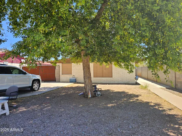 a house with trees in front of it