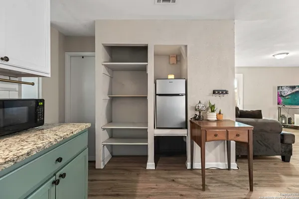 a view of a dining room with furniture