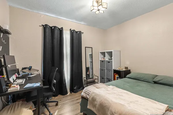a bathroom with a sink a toilet and a bathtub