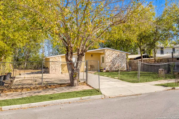 a backyard of a house with entertaining space
