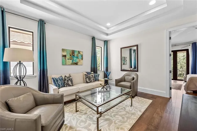 a living room with furniture and a couch