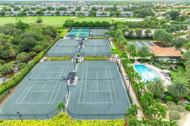 a view of a swimming pool and a yard