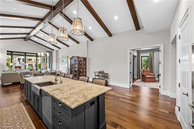 a kitchen with a stove and a sink