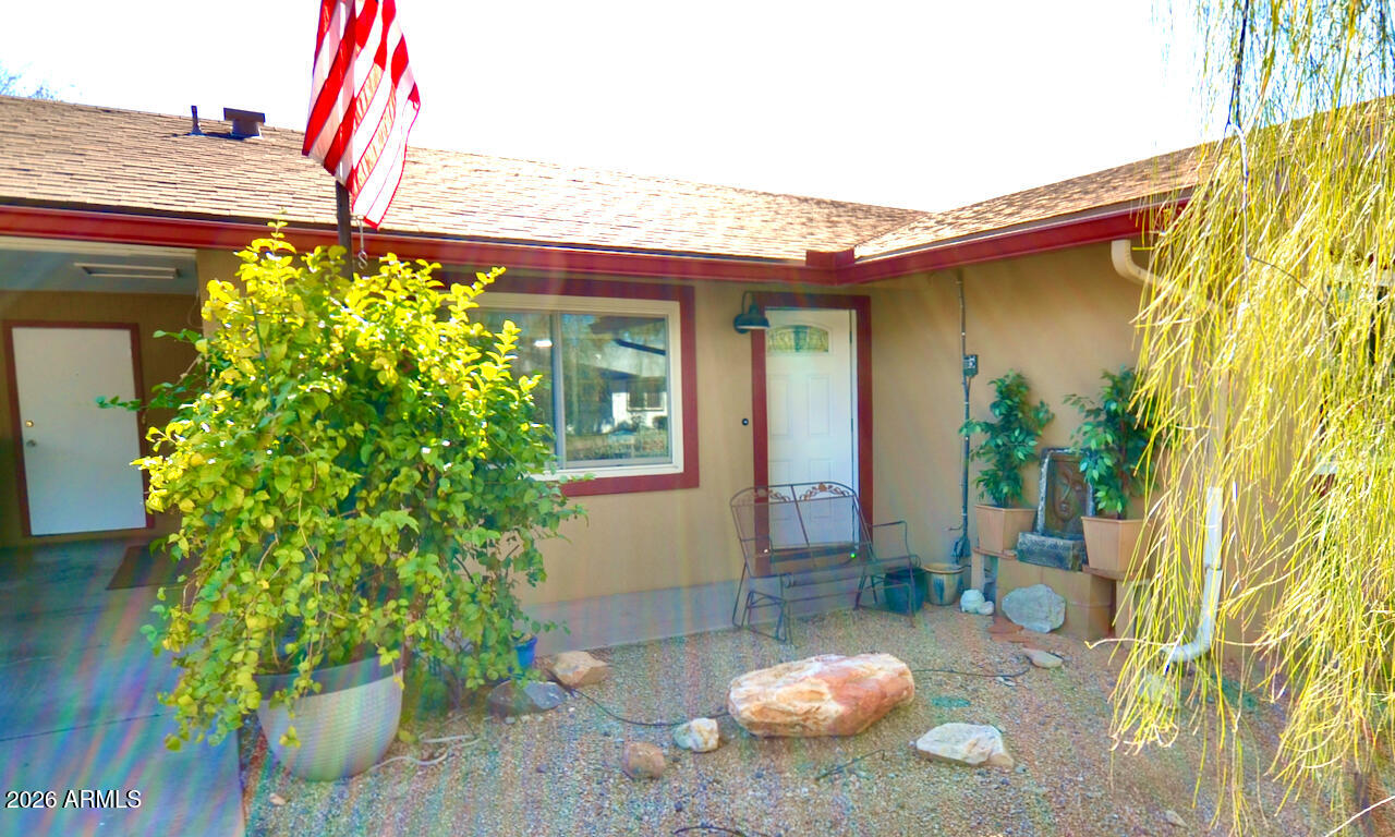 1215 West Colter Street Phoenix, AZ 85013 - Photo 10 of 41 a front view of a house with a yard