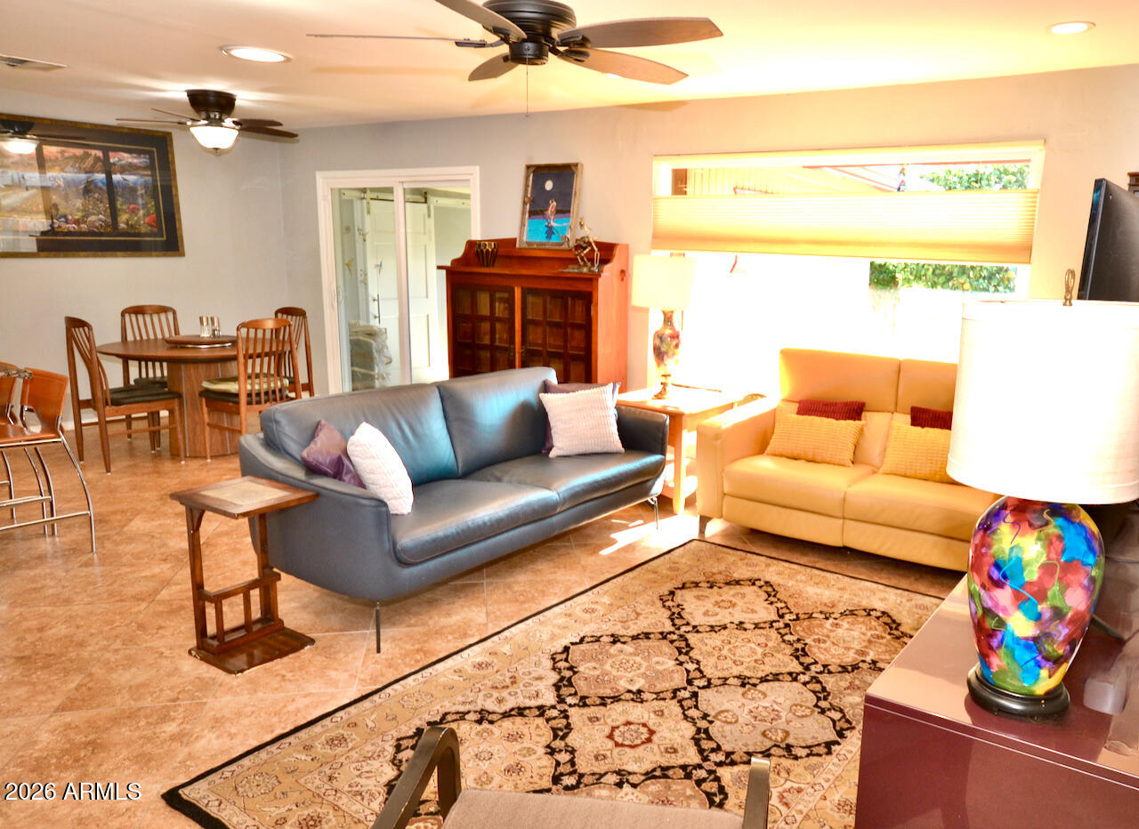 1215 West Colter Street Phoenix, AZ 85013 - Photo 20 of 41 a living room with furniture and a couch