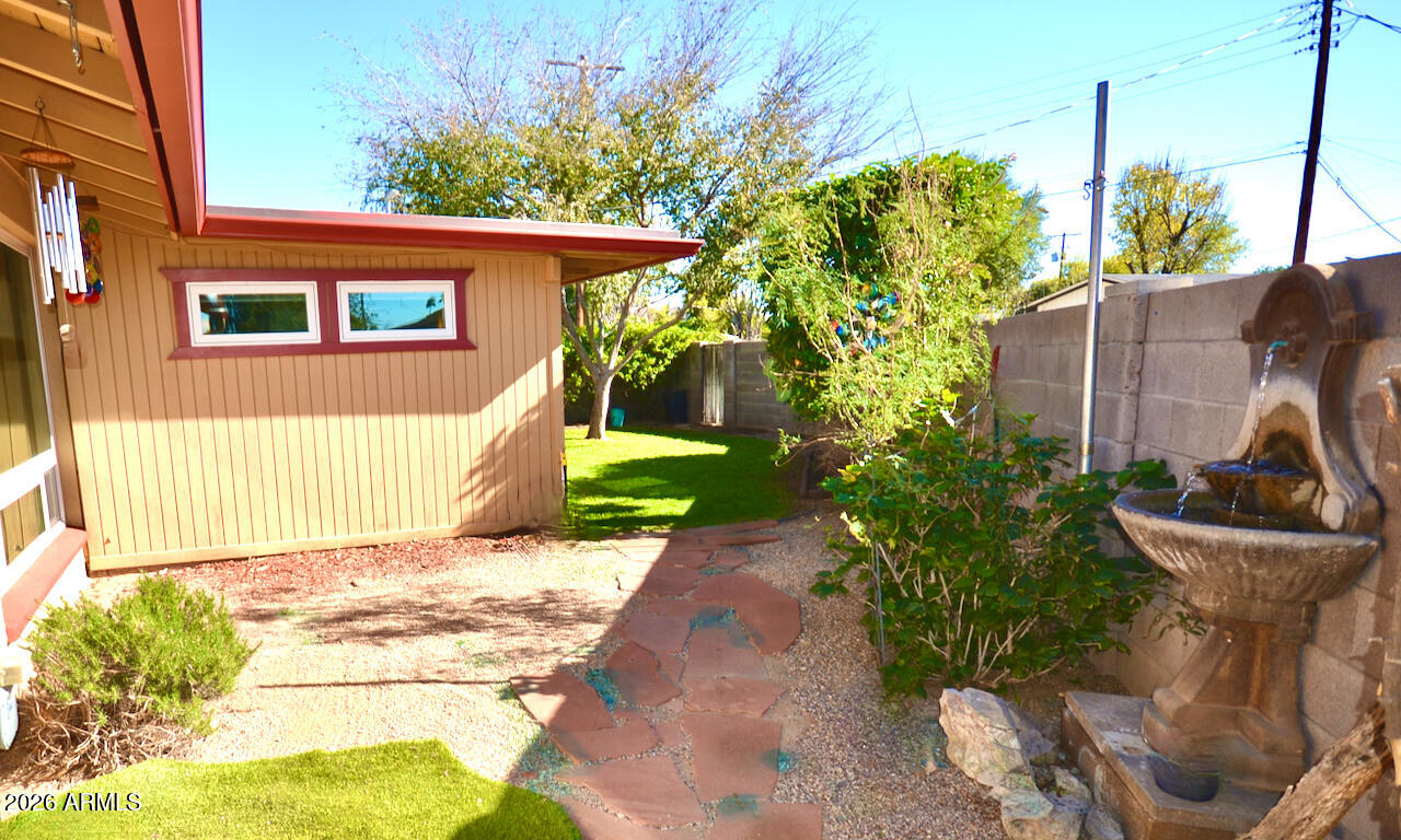 1215 West Colter Street Phoenix, AZ 85013 - Photo 34 of 41 a view of a house with backyard and sitting area
