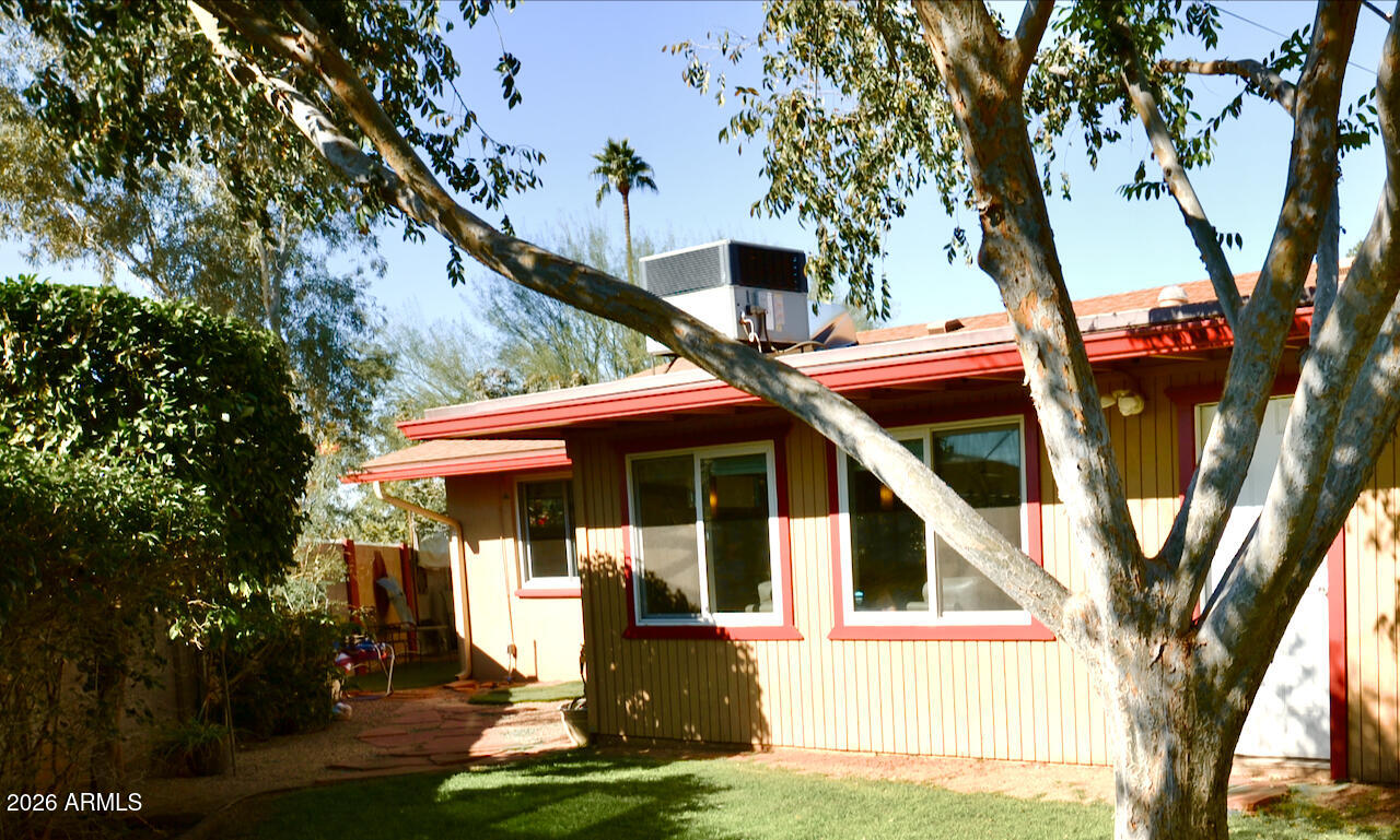 1215 West Colter Street Phoenix, AZ 85013 - Photo 38 of 41 a front view of a house with a yard
