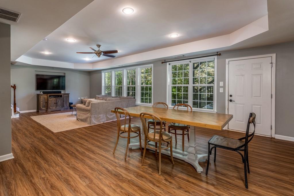 146 Edgewater Trail Canton, GA 30115 - Photo 20 of 25 a view of a dining room with furniture window and wooden floor