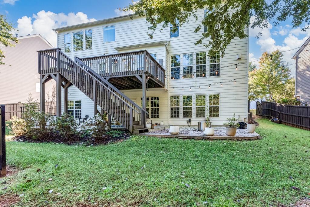 146 Edgewater Trail Canton, GA 30115 - Photo 25 of 25 a front view of a house with a yard and porch